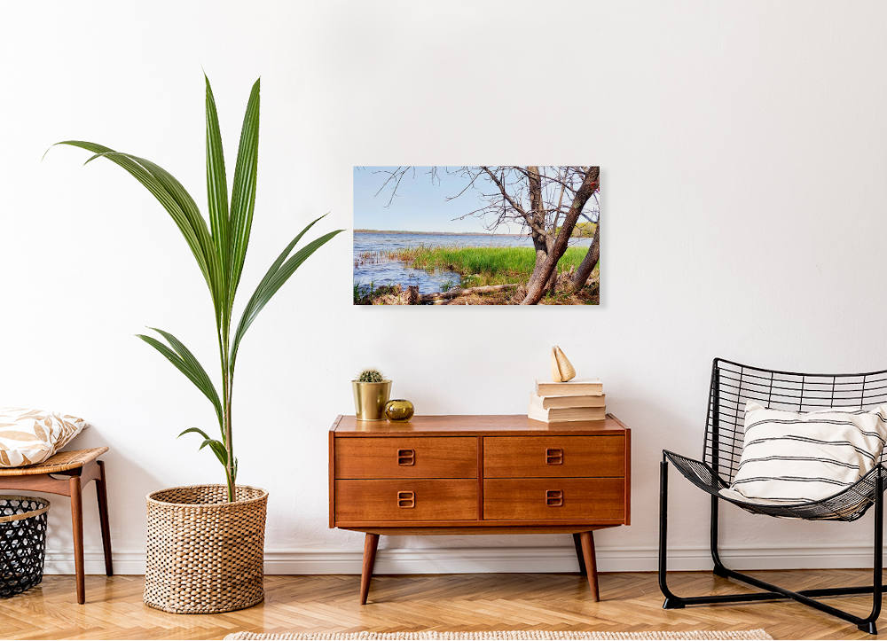 boat-lake-stretched-canvas-mounted-wall print of boat lake photo mounted on wall above wooden table